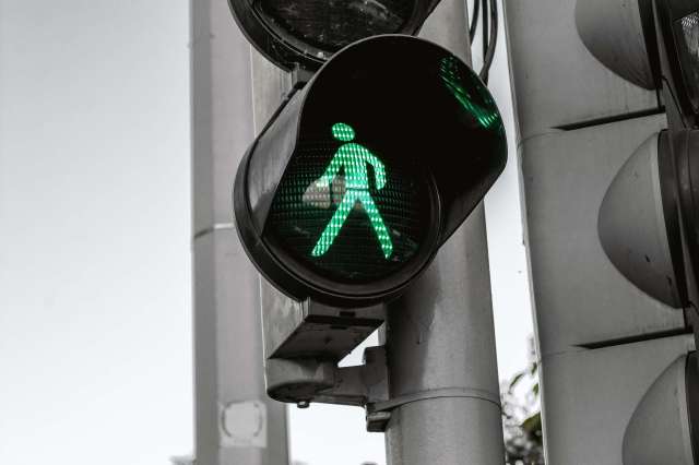Close-up photo of a green traffic light Close-up photo of a green traffic light