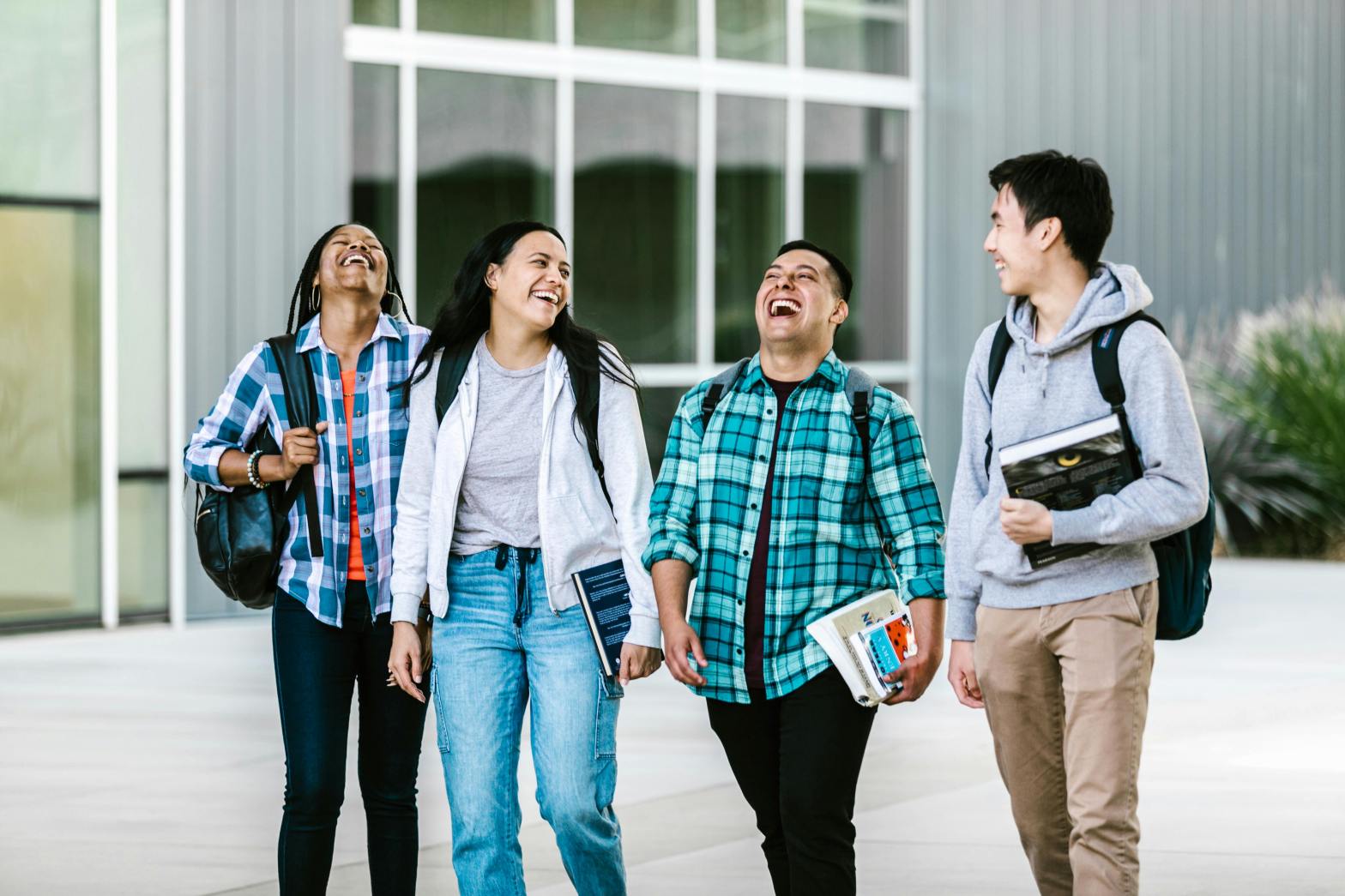 Group of college students on campus on the way to class