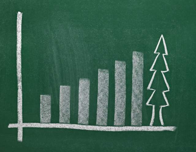 close up of chalkboard with finance business graph and christmas tree.jpeg